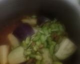 A picture of step 2 of Broad bean seeds and Brinjal sabji.