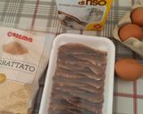 Foto del passaggio 1 della ricetta Alici fritte dorate