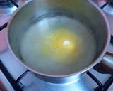 Foto del paso 12 de la receta: Tarta de queso, limón y vainilla con glaseado de pasas al ron