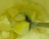 A picture of step 2 of Yogurt with sliced apple n banana.
