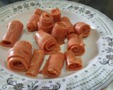 A picture of step 1 of Red khandvi in yellow daal.