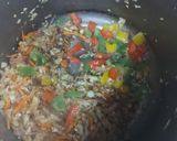A picture of step 2 of Chicken egg fried rice with noodles.