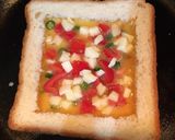 A picture of step 5 of Cheese Tomato Egg Toast.