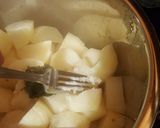 A picture of step 4 of Rich and Creamy Mashed Potatoes (in a pressure cooker!).