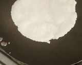 A picture of step 6 of Pathiri (Rice flour Roti) with chana.