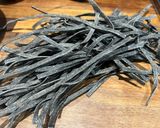 A picture of step 1 of Tagliolini al nero di seppia con granchio – Venetian squid ink tagliolini with crab.