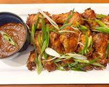 A picture of step 14 of Chicken wings with banana ketchup.