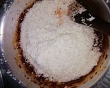 A picture of step 5 of Pilau served with cabbage and salad.