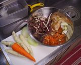 A picture of step 1 of Braised Pork belly and sweet potato with tomato.