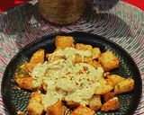 A picture of step 8 of Cheesey Spicy Garlic Potato.