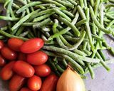 Une image de l'étape 1 de Poêlée de haricots verts et tomates cerises.