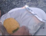 A picture of step 5 of Kesariya tri-colour mawa roll.