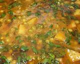 A picture of step 18 of Alu matar gravy.