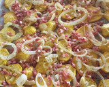 Foto del paso 3 de la receta: Truchas arcoíris con cama de papas y cebolla