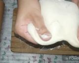 صورة لخطوة 2 من وصفة عجينه البيتزا باسهل طريقه