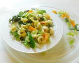 A picture of step 6 of Tortellini Pasta with white sauce.