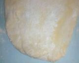 A picture of step 2 of Egg wrapped in sausage and puff.
