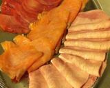 Une image de l'étape 2 de Vacherin mont d or au four façon fondue avec pommes de terre saumon bacon et jambon blanc.