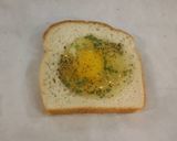 A picture of step 5 of Egg Cheese Toast.