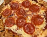A picture of step 4 of Cast Iron Skillet Pepperoni Onion Pizza.