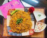 A picture of step 3 of Patato rice with raita and salad.