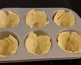 A picture of step 3 of Individual Ham and Cheese Puff Pastry Quiche.