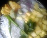 A picture of step 1 of Konkan Raw Mango Curry.