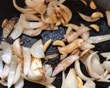 A picture of step 1 of Lasooni Paneer A thick gravy flavourful Paneer Dish.