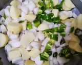 A picture of step 1 of Aloo or mooli ki sabji.
