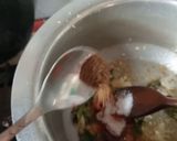 A picture of step 4 of Chicken 65 with sauce/Gravy.
