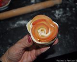 A picture of step 12 of Apple rose shaped cakes.