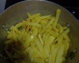 A picture of step 1 of French-Celery fries with fried eggs.