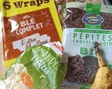 Une image de l'étape 1 de Wrap chaud bananes, amandes effilées et pépites de chocolat.