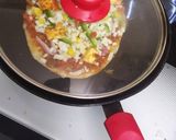 A picture of step 7 of પનીર ટીક્કા નાન પીઝા.