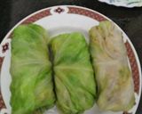 A picture of step 11 of Nutty lemony cabbage roll in green sauce.