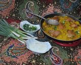 A picture of step 12 of Turmeric Rice with Chicken کته زردچوبه با مرغ.