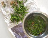 A picture of step 1 of Green Chillies Pickle 'Zasar Pima