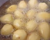 A picture of step 1 of Small Potato Curry (Bateti nu rasa valu shak).