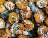 A picture of step 6 of Oven roasted chilli potato.....