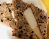A picture of step 4 of Sweet cheesy paratha with choco syrup.