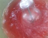 A picture of step 3 of Rooh afza drink with chia seeds.