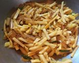 A picture of step 3 of Bengali Aloo Pyaaz Chocchori.