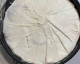 A picture of step 2 of Portuguese Maria cookie cake.