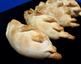 Foto del paso 5 de la receta: Empanadas de sardina con champiñones, cebolla caramelizada y huevo