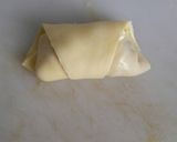 A picture of step 4 of Ham and cheese crossiant.