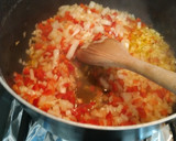 Foto del paso 2 de la receta: Berenjenas horneadas con pollo y tomate