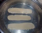 A picture of step 26 of Sugar coat khaja.