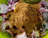 A picture of step 4 of Ragi mudda with mutton curry.