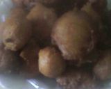 A picture of step 3 of Kaimati coated with sugar syrup.