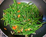 A picture of step 9 of Dry Fry Green Beans.